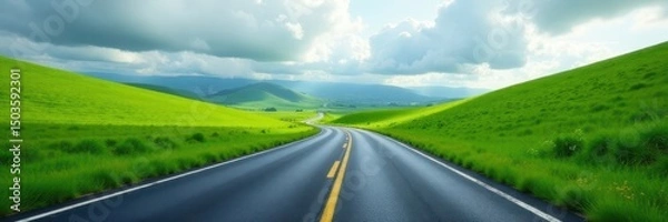 Obraz Winding asphalt road disappearing into a lush green landscape against a cloudy sky , color, cloud, green