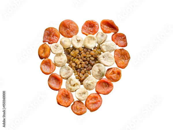 Fototapeta Assortment of dried figs, raisins and apricots in the form of heart isolated on white background