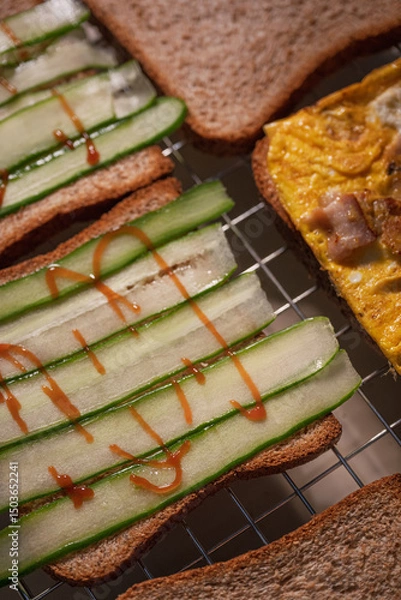 Fototapeta Delicious Cucumber Toast with Fried Egg