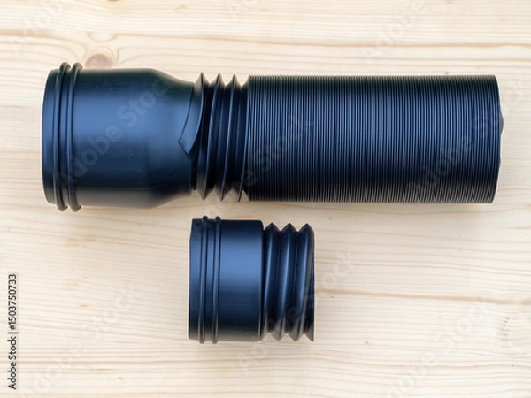 Fototapeta Rain gutter extension set. Flexible black PE drain extension. The downpipe extension for home  