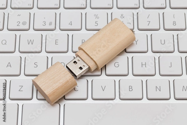 Obraz USB flash drive wooden on white keyboard