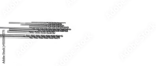 Fototapeta High speed steel spiral drill bits designed for cutting metal in manufacturing environments, shown from above on a clean white background, ideal for industry, tool, and hardware photo needs
