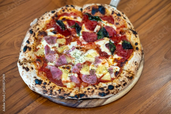 Fototapeta Close up of Pepperoni and Hawaiian Pizza on the table.