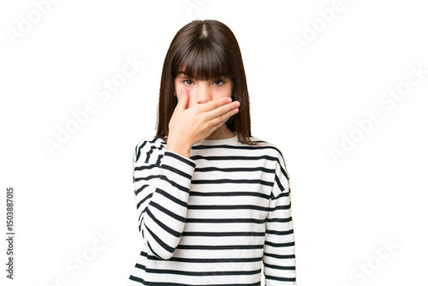 Fototapeta Little caucasian girl over isolated background covering mouth with hand