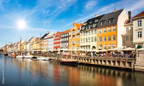 Obraz Colorful traditional houses in the Old port of Nyhavn in Copenhagen, Denmark. Nyhavn port is a popular travel destination and main landmark of Copenhagen city