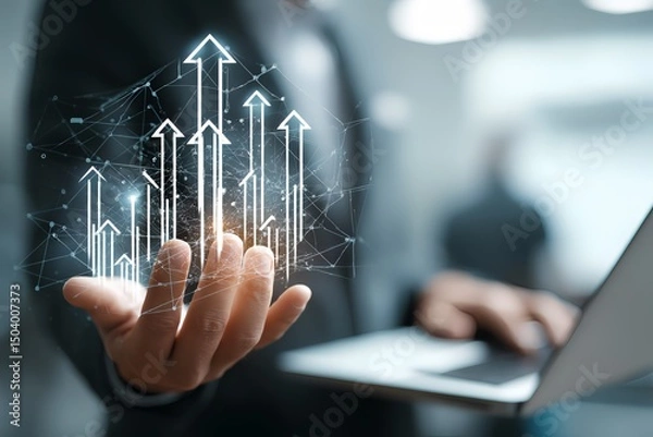Obraz A person holding a conceptual image of financial growth, featuring upward pointing arrows