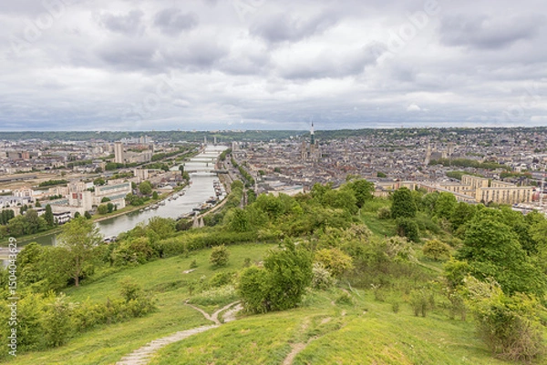 Fototapeta View over Rouenwith Lacroix Island in the middle of the Seine and the old city to the right, seen from the Saint Catherine viewpoint