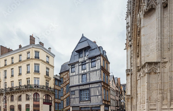 Fototapeta Half timbered houses at the Place Barthelemy in Rouen around the Saint Maclou church in the historic part of the city