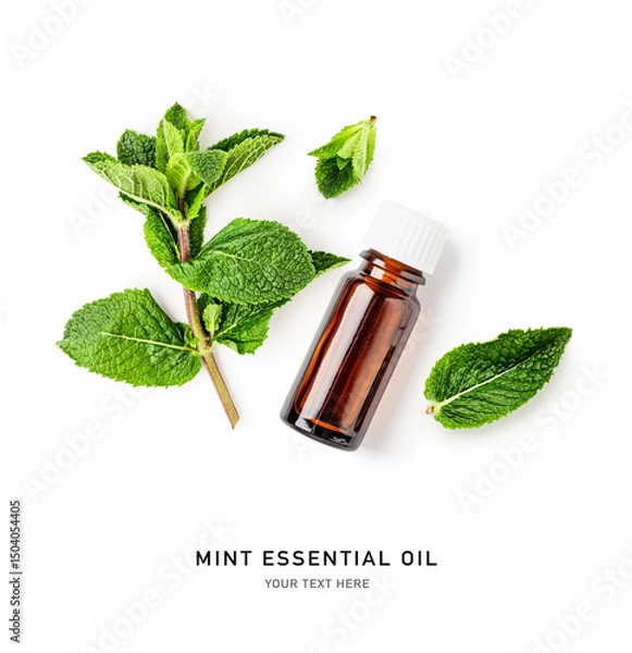 Obraz Mint essential oil in bottle, fresh peppermint leaves photography isolated on white background.
