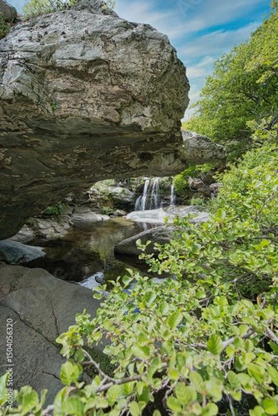 Obraz Small Waterfall in Lush Forest on Andros Island, Greece..