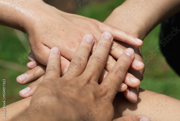 Fototapeta Unity and Collaboration Concept with Diverse Hands on Top of Each Other