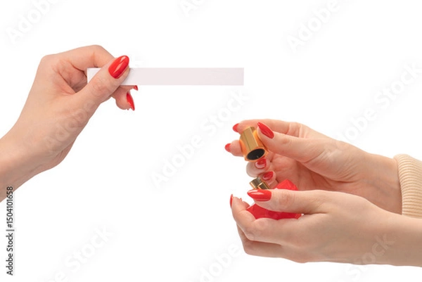 Obraz Woman hand with red nails with test strips for the perfume, isolated on a white background.