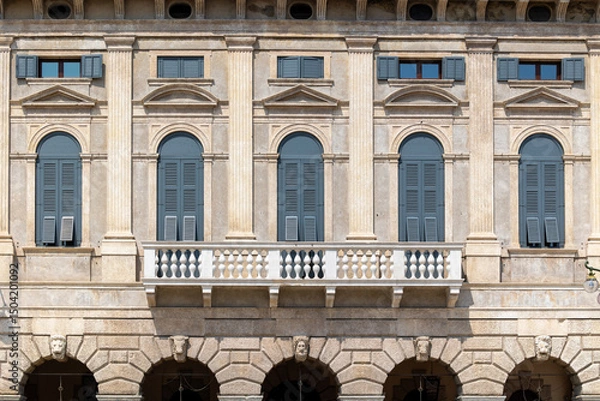 Fototapeta Classical European Building Facade with Neoclassical Architecture, Columns and Blue Shutters