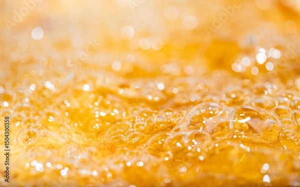Fototapeta Close up bright orange Oil or beer splash texture and nature waves, Beautiful waves curve and little bubbles smooth for graphic design and background, Oil Bubbles, Soft beer bubbles, Selective focus