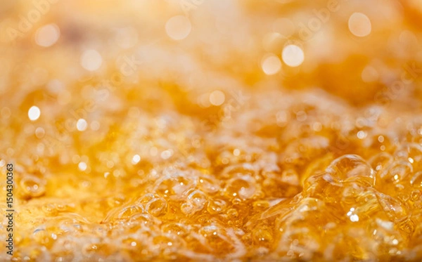 Fototapeta Close up bright orange Oil or beer splash texture and nature waves, Beautiful waves curve and little bubbles smooth for graphic design and background, Oil Bubbles, Soft beer bubbles, Selective focus