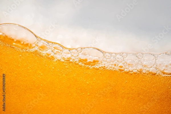 Fototapeta Close up bright orange Oil or beer splash texture and nature waves, Beautiful waves curve and little bubbles smooth for graphic design and background, Oil Bubbles, Soft beer bubbles, Selective focus