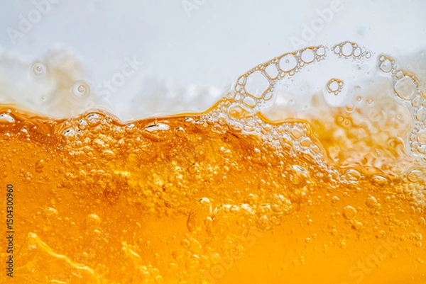 Fototapeta Close up bright orange Oil or beer splash texture and nature waves, Beautiful waves curve and little bubbles smooth for graphic design and background, Oil Bubbles, Soft beer bubbles, Selective focus