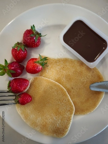 Fototapeta pancakes with strawberries