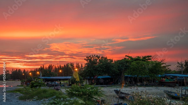 Fototapeta Background: Sunrise.  Sunset is a dramatic and majestic scene.  Sky with clouds.  Sunrise skylight background.  Sunrise with clouds of various kinds.
