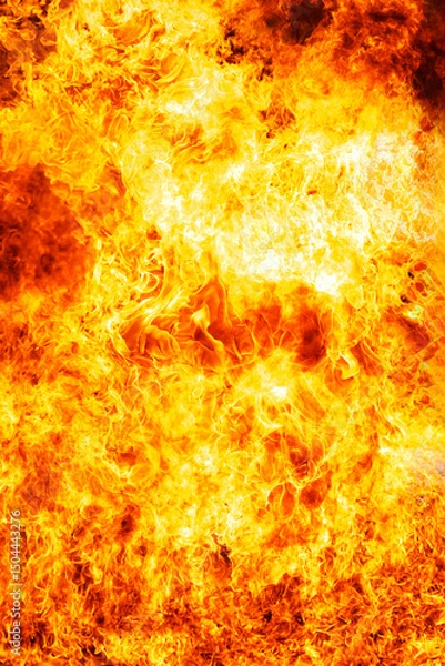 Obraz Intense blazing fire flames in vivid detail. Perfect as a background or texture for heat, danger, destruction, or energy-themed concepts.