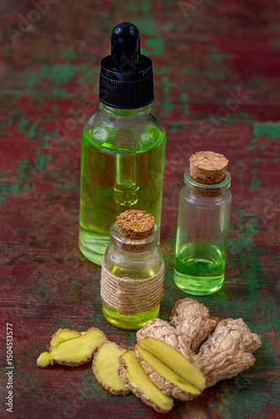 Fototapeta Creative display of oils and ginger