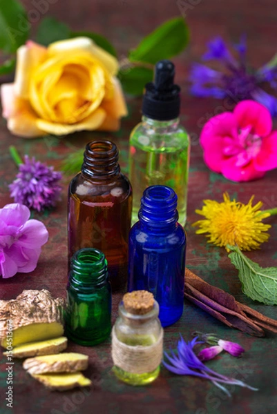 Fototapeta Vibrant display of herbs and oils