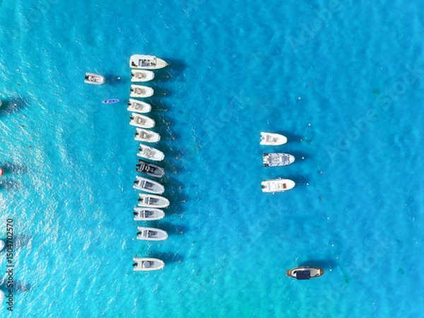 Fototapeta Vacation and leisure. Seascape with motorboat. Aerial view on fast boats on blue Mediterranean sea at sunny day. Fast ships on the sea surface. Seascape from the drone.