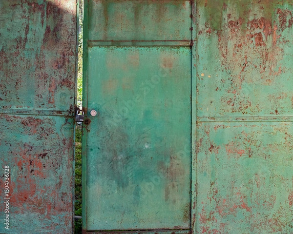 Obraz background of Weathered and rusted gate entrance
