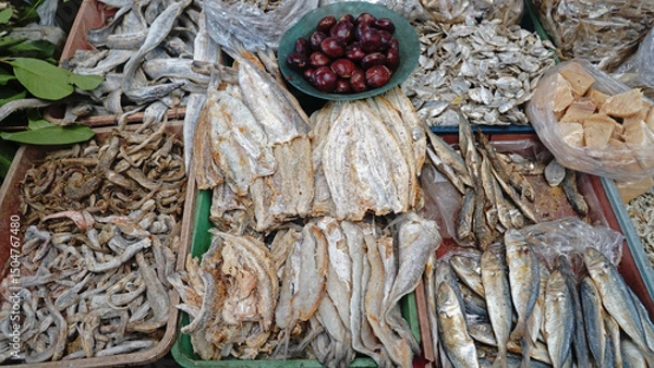 Obraz Various types of dried salted fish at a traditional market stall