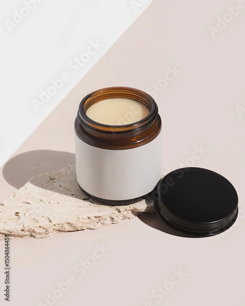 Fototapeta Natural and organic beef tallow balm on tan background with product texture