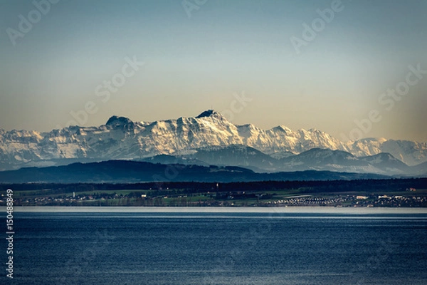 Fototapeta Berg Säntis mit Schnee am Bodensee