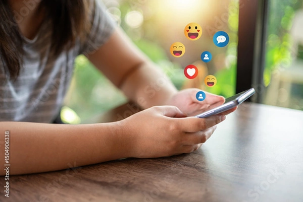 Obraz Social Distancing ,Working From Home concept..The concept of living on vacation and playing social media. Social media and digital online concept, man using smart phone with Social media..