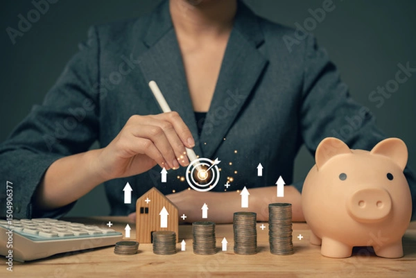 Obraz Savings for investing in business. The concept of setting goals for savings. Setting goals for fixed deposits with banks. The concept of insurance for savings limits...