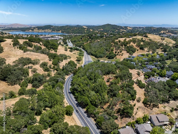 Obraz Aerial views of the San Marin neighborhood and surrounding hills in Marin County, California. Suburban homes, winding roads, and oak-dotted golden hills define the scenic North Bay landscape.