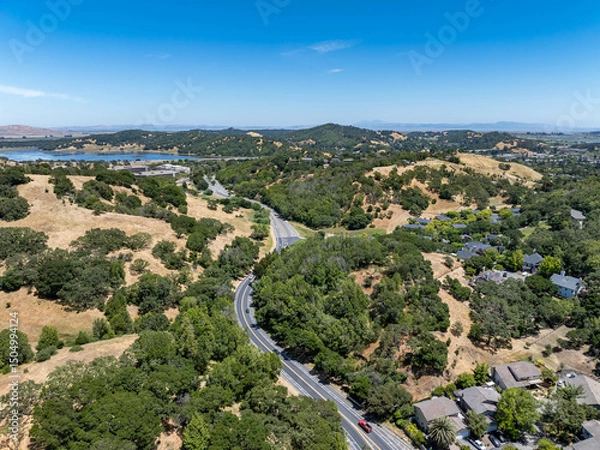 Obraz Aerial views of the San Marin neighborhood and surrounding hills in Marin County, California. Suburban homes, winding roads, and oak-dotted golden hills define the scenic North Bay landscape.