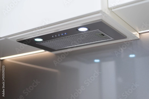 Obraz A clean range hood in the kitchen