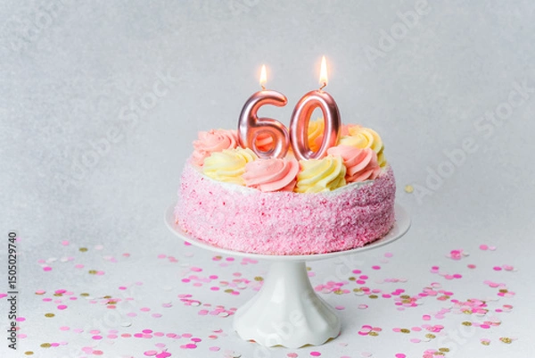 Obraz Celebrate a 60th birthday with a beautiful pink cake and candles