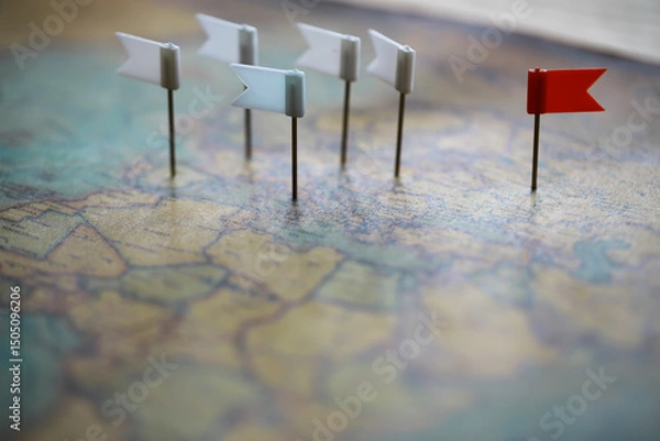 Fototapeta Colorful Map with Red and White Flag Pins Indicating Locations