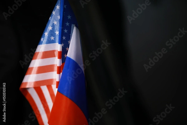 Obraz Close-Up of American and Russian Flags against Dark Background