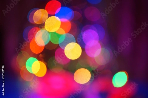 Fototapeta New Year's colorful illumination. Blurred bright background. Bokeh.