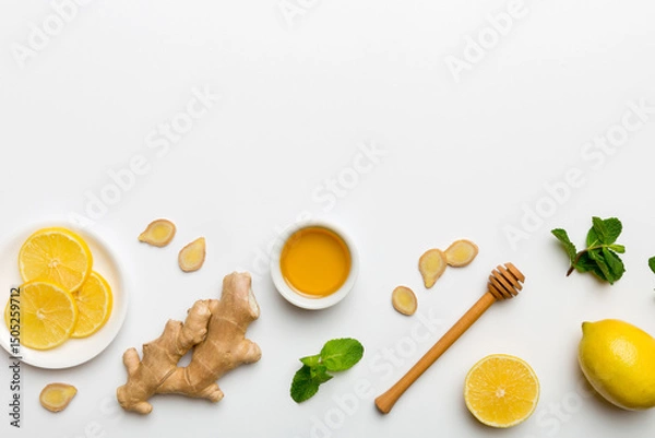 Fototapeta Natural cold and flu home remedies. Natural ingredients for immunity stimulation and viruses protection. top view flat lay