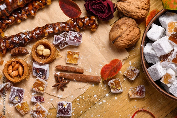 Obraz Sweet food Turkish delight on wooden background, assorted locum and candy for decorated backdrop