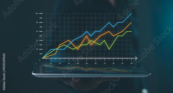 Fototapeta A digital tablet displays a glowing, upward-trending line graph, symbolizing data growth, analysis, and business progress.