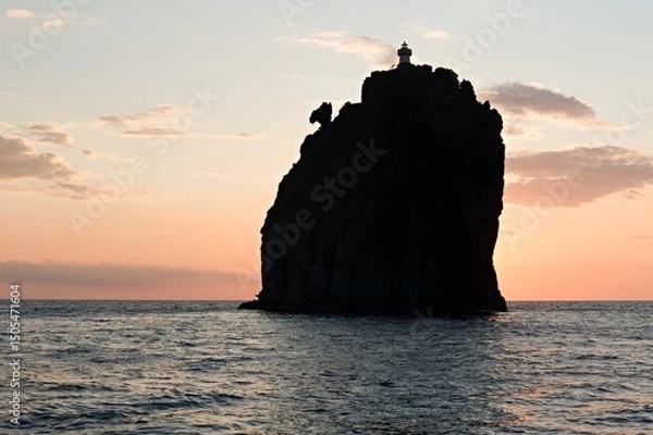 Obraz View of Strombolicchio island and Tyrrhenian Sea at sunset near Stromboli island. Aeolian (Lipari) islands. Italy. Europe.