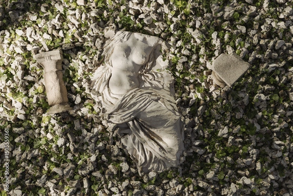 Fototapeta Ancient female torso next to columns covered by travertine stones. 3D Rendering
