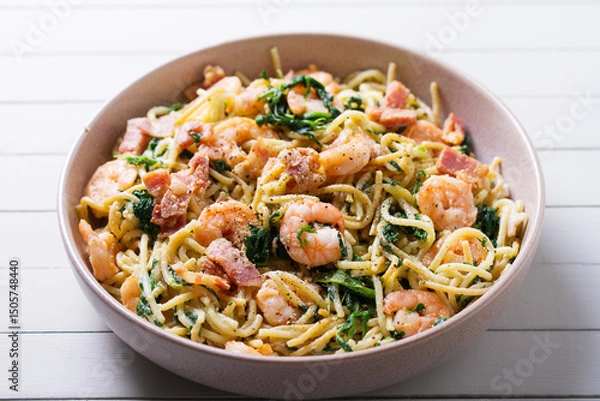 Fototapeta Prawn and bacon pasta with spinach. Spaghetti