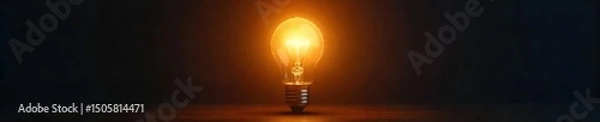 Fototapeta Bright light bulb illuminating a dark room, symbolizing a brilliant idea or innovative solution Perfect for concepts related to inspiration, creativity, and problem-solving , progress, optimism