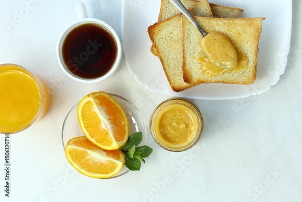Fototapeta Tasty breakfast with toasts on table