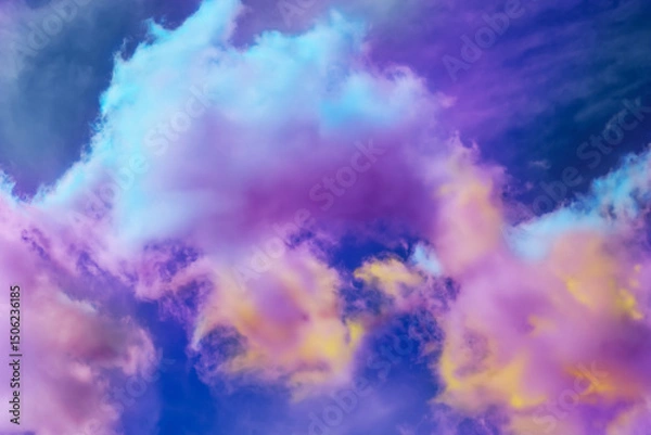 Fototapeta Fluffy color clouds floating in beautiful blue sky