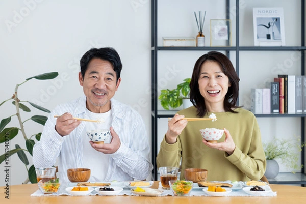Obraz 食事をするミドルの夫婦